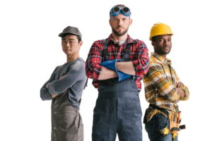 group of multiethnic construction workers with folded arms